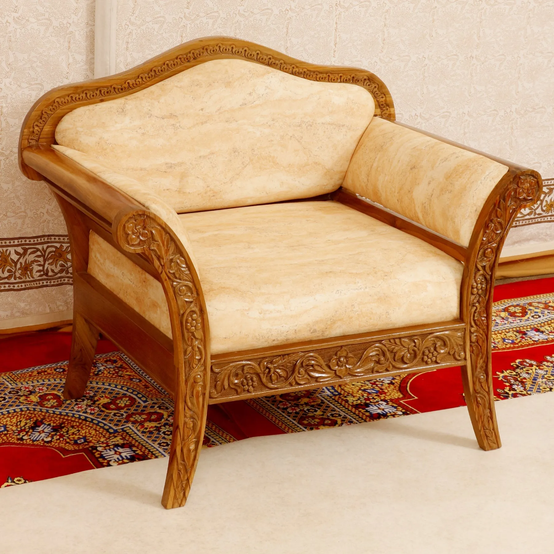 Intricate carved teak wood Single seater sofa