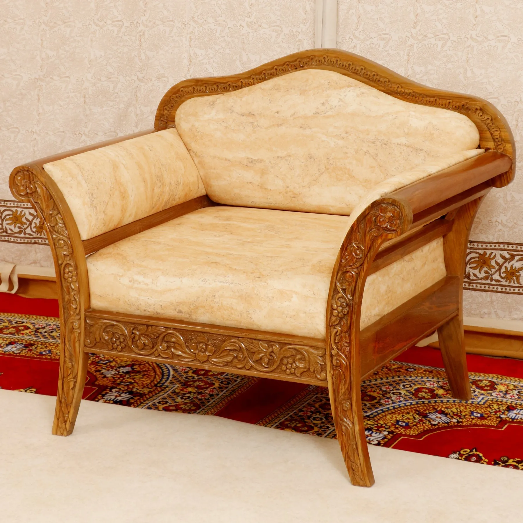 Intricate carved teak wood Single seater sofa