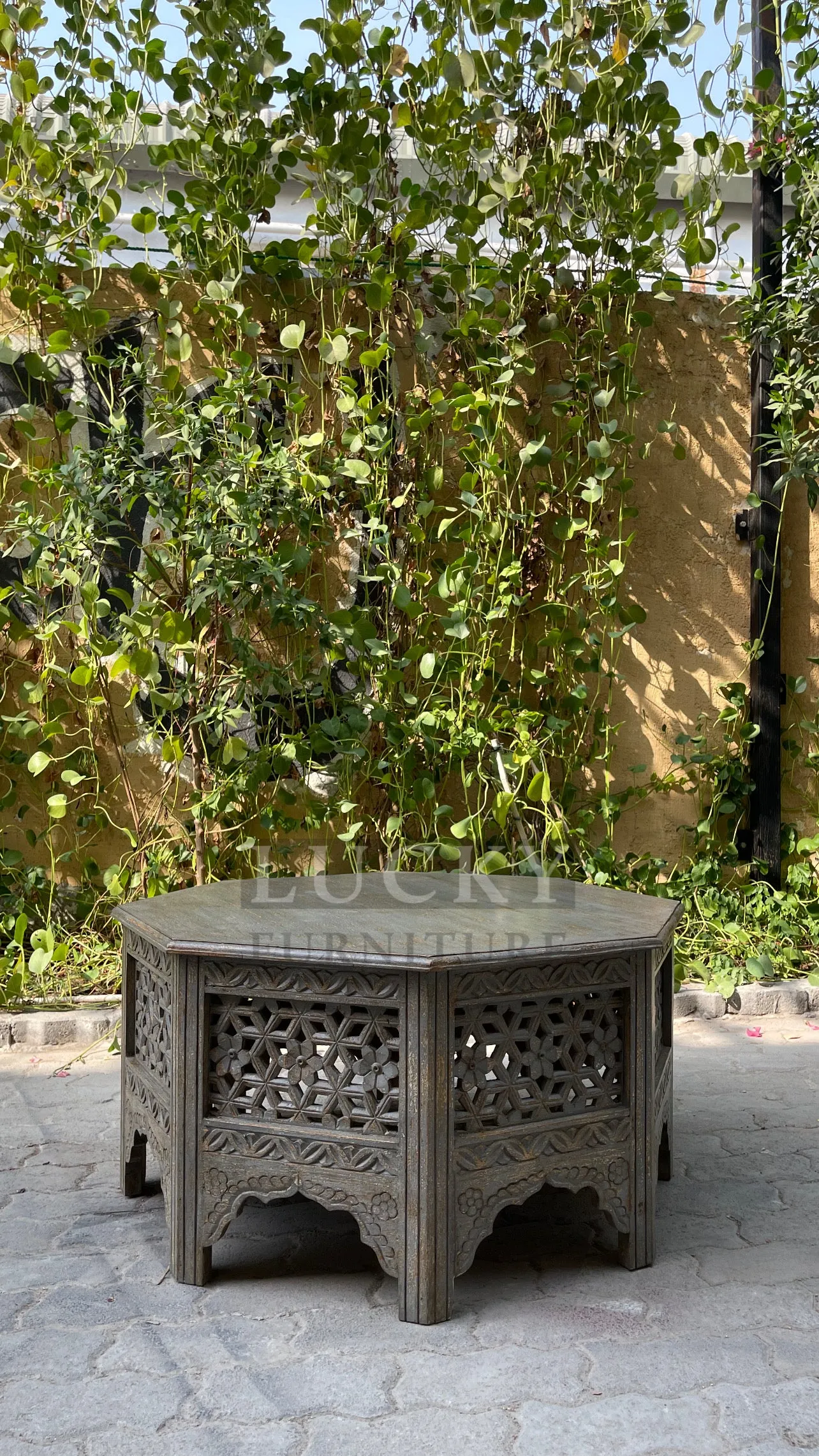 Octagonal carved coffee table